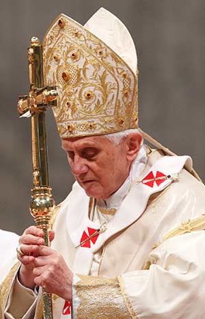  Pope Benedict XVI holds his pastoral staff at the conclusion of Mass on the feast of Mary Mother of God in St. Peter's Basilica at the Vatican in this Jan. 1, 2011, file photo. The pope announced that Feb. 11 that he will resign at the end of the month. (CNS photo/Paul Haring)