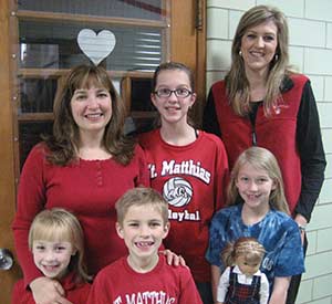 Kris (Hoepfl) Ruppin, back left, and Jane (Hapke) Barwick, back right, both St. Matthias School, Milwaukee class of 1980 have sent their children to the same school. Pictured between the women is Noel Barwick, a sixth grader. Front row, left to right, are Katie Ruppin, K5, Danny Ruppin and Jenna Barwick, both third graders. (Submitted photo courtesy Kris Ruppin)