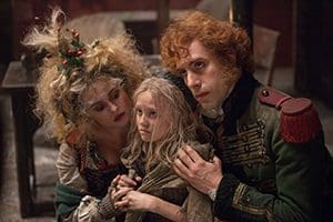 Helena Bonham Carter, Isabelle Allen and Sacha Baron Cohen star in a scene from the movie "Les Miserables." John Mulderig of Catholic News Service's Media Review Office ranked the film as one of the top 10 family films for 2012. (CNS photo/Universal)