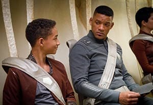 Jaden Smith and Will Smith star in a scene from the movie "After Earth." The Catholic News Service classification is A-III - adults. The Motion Picture Association of America rating is PG-13 - parents strongly cautioned. Some material may be inappropriate for children under 13. (CNS photo/Columbia)