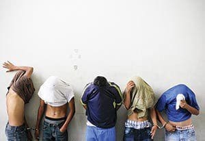 Barrio 18 gang members accused of killing a bus driver in San Salvador, El Salvador, are presented to media July 29, 2015. (CNS photo/Oscar Rivera, EPA)