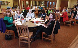 Mary Laurenz, left to right, Janet Freng, Julie Field, Alice Stanula and Pat Ruman watch a video during a gathering of Grace Group at St. Anne Parish in Pleasant Prairie, March 17. (Catholic Herald photo by Allen Fredrickson)
