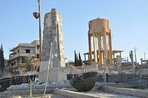 A view shows the damage in the town of Qaryatain, Syria, April 4, after forces loyal to Syrian President Bashar Assad recaptured it. The relics of Syrian St. Elian, which originally were thought to have been destroyed by members of the so-called Islamic State militia, have been found amid the rubble of the desecrated Mar Elian Church in Qaryatain. (CNS photo/Syria's national news agency handout via Reuters)