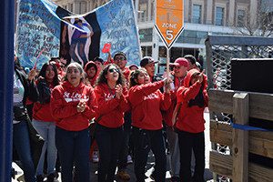 Hundreds of members of the Jornada Movement in the Diocese of Brooklyn, N.Y., march through the street in the borough of Queens March 26. The young people spent hours that day walking, praying the rosary and bearing witness to their Catholic faith. (CNS photo/Maria-Pia Negro Chin, The Tablet)
