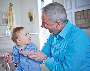  Tim Cascio plays with 1-year-old-son Culen. (Catholic Herald photos by Juan C. Medina)