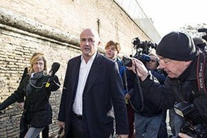 Italian journalist Gianluigi Nuzzi is surrounded by the media as he arrives for the third hearing of the 'VatiLeaks' case at the Vatican Dec. 7. (CNS photo/Massimo Percossi, EPA)