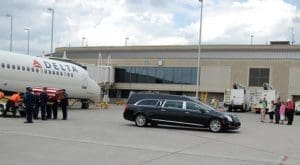 On Tuesday, May 24, the remains of Airman 2nd Class Thomas Condon are unloaded at Mitchell International Airport from a Delta flight and escorted with United State Air Force honor guard, 64 years after his death. 