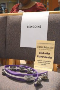An empty seat keeps alive the memory of Ted Goins during the Brother Booker Ashe Lay Leadership graduation prayer service on Sunday, June 5 at All Saints Church, Milwaukee. Goins died unexpectedly two weeks before he was to graduate from the program. (Submitted photo courtesy the Goins family)