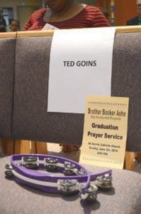 An empty seat keeps alive the memory of Ted Goins during the Brother Booker Ashe Lay Leadership graduation prayer service on Sunday, June 5 at All Saints Church, Milwaukee. Goins died unexpectedly two weeks before he was to graduate from the program. (Submitted photo courtesy the Goins family)