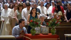 Visitors venerate the relics of St. Thomas More and St. John Fisher June 26 at the Cathedral of St. Paul in Minnesota. The relics of the two saints are on a national tour. (CNS photo/Jim Bovin, Catholic Spirit)