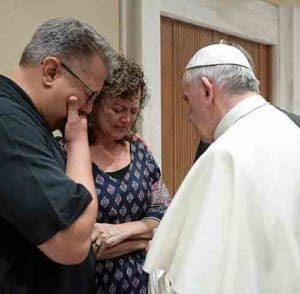 Pope Francis talks with Nick and Jodi Solomon, parents of U.S. student Beau Solomon, during a private meeting at the Vatican July 6. Solomon, a native of Spring Green in the Madison Diocese, was found dead in the Tiber River in Rome July 4. A homeless man was detained as a suspect in the death. (CNS photo/L’Osservatore Romano, handout)