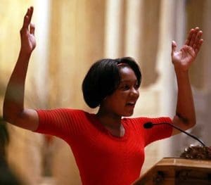 Daija Simmons, now an eighth grader at St. Catherine School, reads from Scripture during a Catholic Schools Week Mass at St. Catherine Parish, Feb. 2. (Catholic Herald photos by Allen Fredrickson)