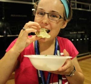 Anna Leitzke enjoys a pierogi, a Polish dumpling, from the Wieliczka Salt Mine. (Submitted photo by Abigail McCallum)