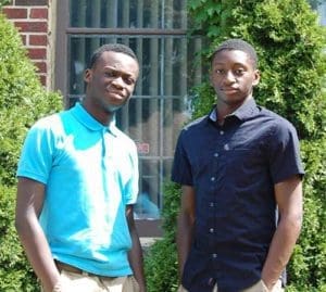 Ezedike Chioma, left, and Chiemeka Choima, stand outside All Saints Church, Milwaukee, on Thursday, Aug. 25. (Catholic Herald photo by Joe Poirier)