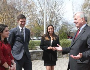 Bill Bowman, dean of the Busch School of Business and Economics at The Catholic University of America in Washington D.C., chats with students on campus. (Submitted photo courtesy The Catholic University of America)