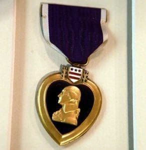 A close-up of the Purple Heart awarded to Private Boleslaw Adamski during his service in World War I. It was located on eBay before being returned to Adamski’s
family in August. (Catholic Herald photo by Allen Fredrickson)