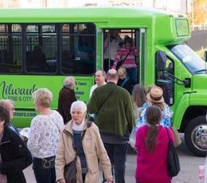 shuttles take the 1,100 tourists from parish to parish during the six-hour event. Participating parishes were Our Lady of Guadalupe, Immaculate Conception and All Saints, Milwaukee, and St. Bernard, Wauwatosa. (Catholic Herald photos by Peter Fenelon) 