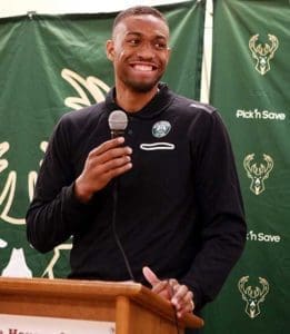 Milwaukee Bucks’ player Jabari Parker addresses the gathering at the House of Peace on Thursday, Nov. 22.