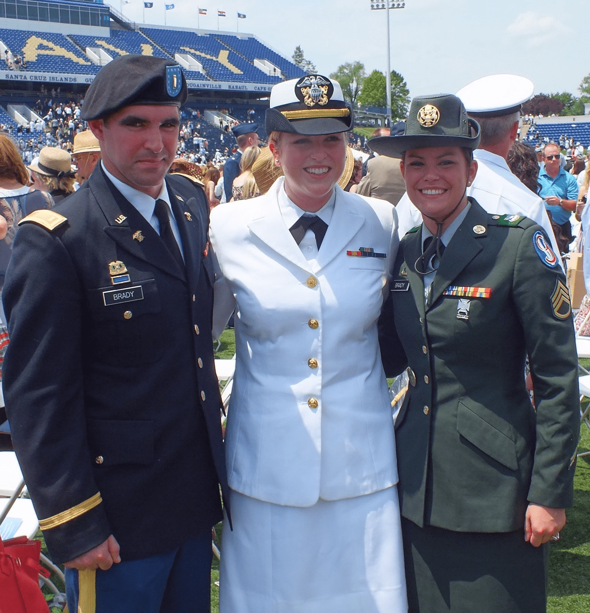 Photo of Henry, Kerry, and Elizabeth Brady at Kerry’s graduation from the Naval Academy.