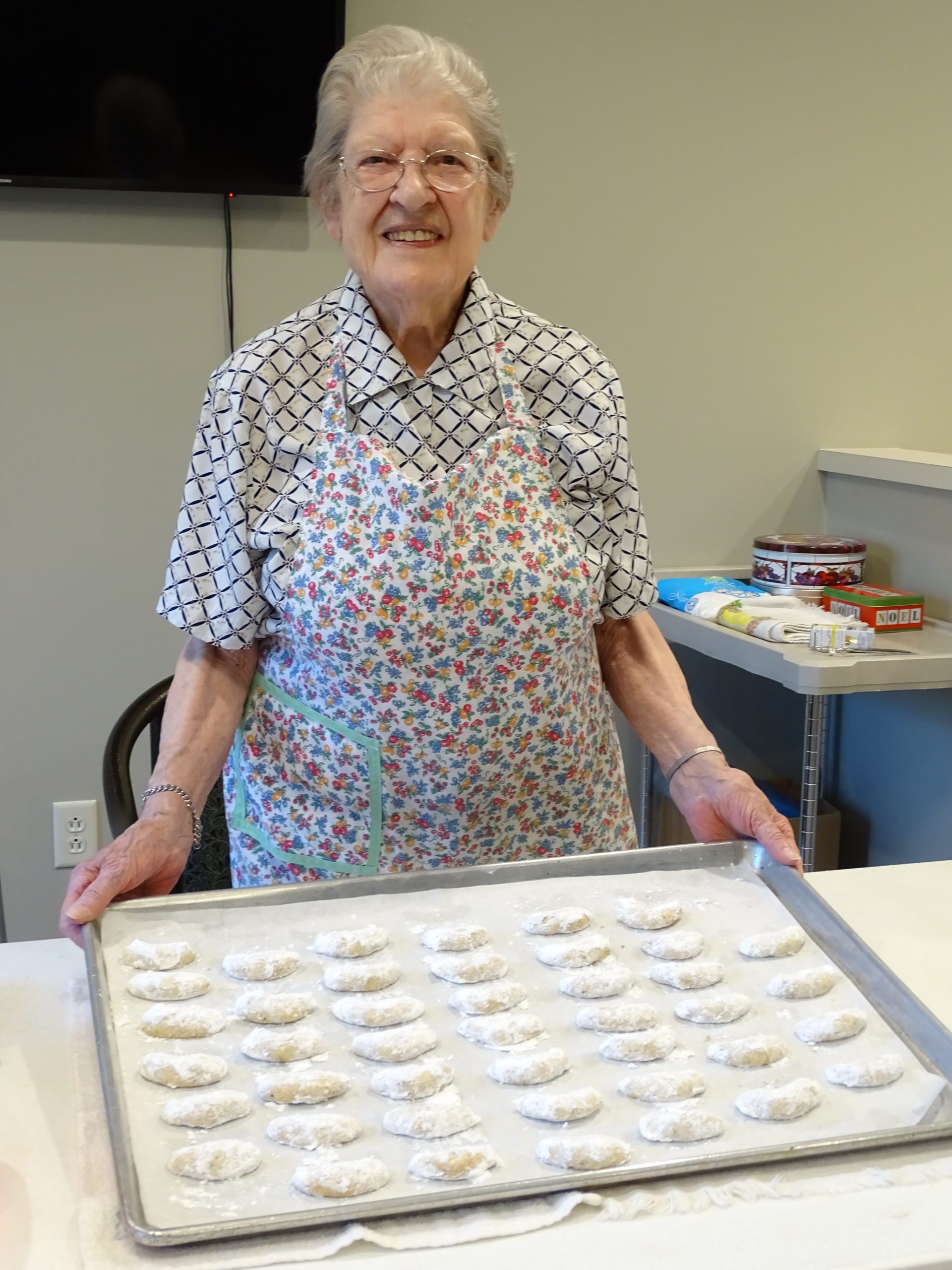Sister Lenore with tray of cookies