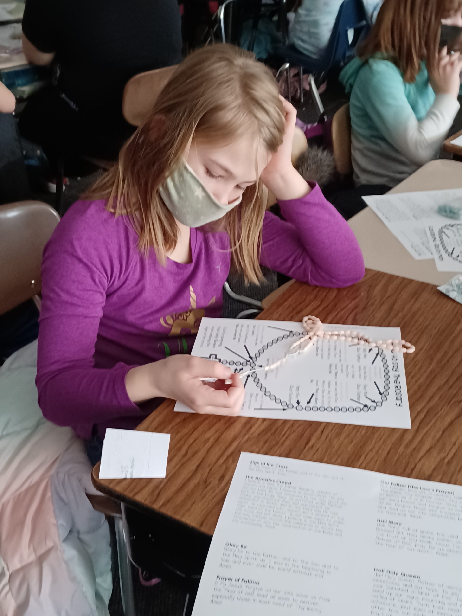 Mylee Hansen learning rosary
