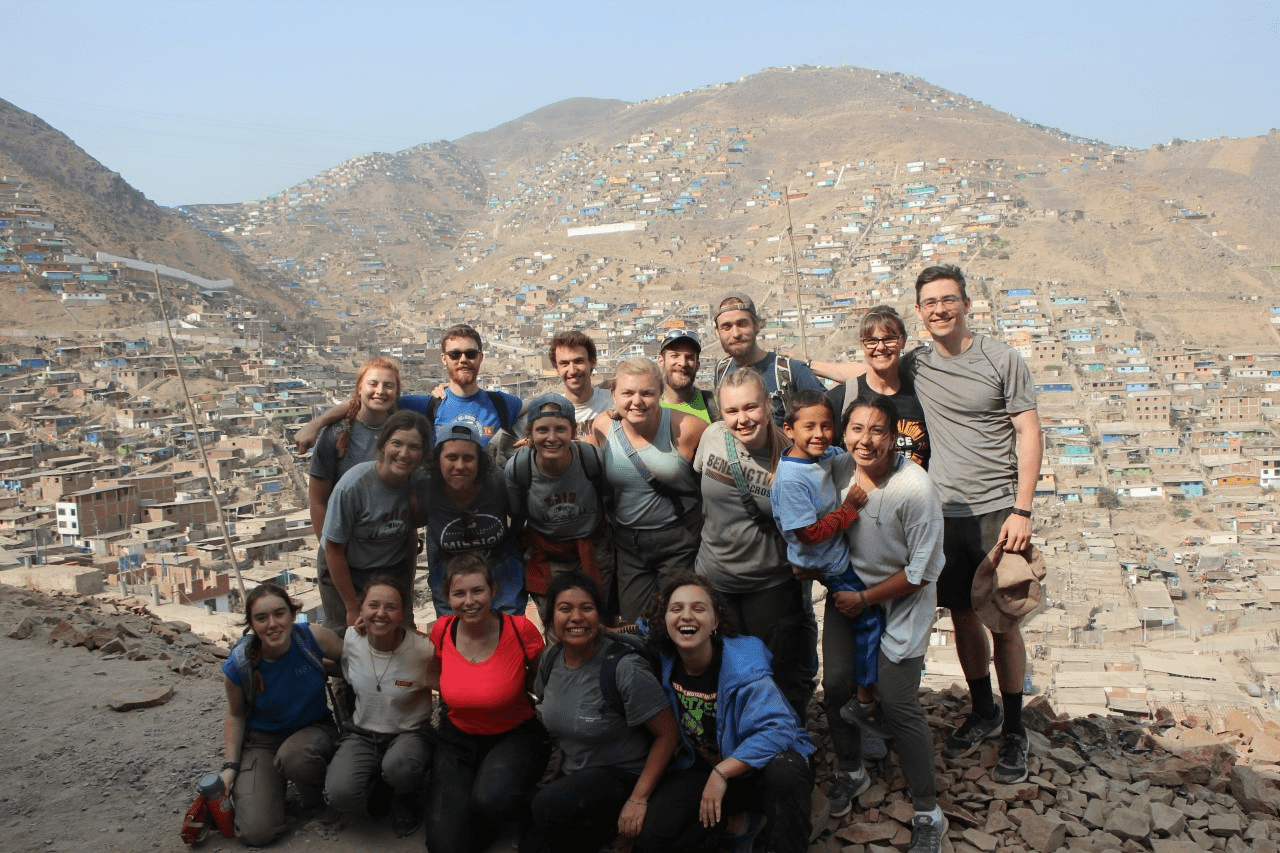 Another group photo with Pamplona in the background.