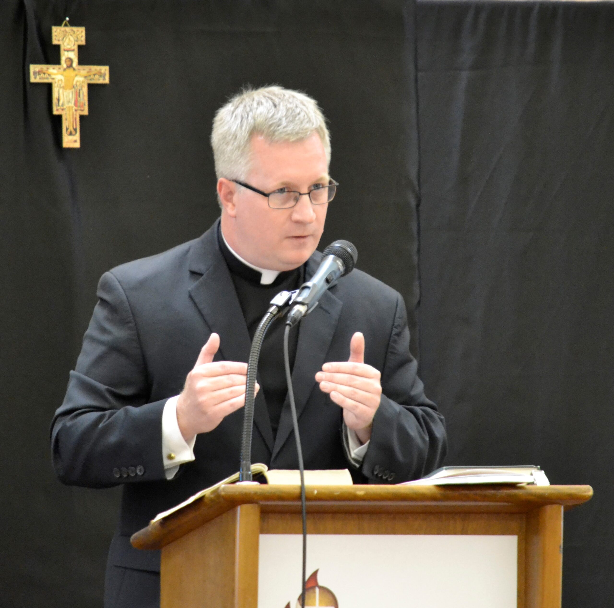 Fr. Justin K speaking at conference