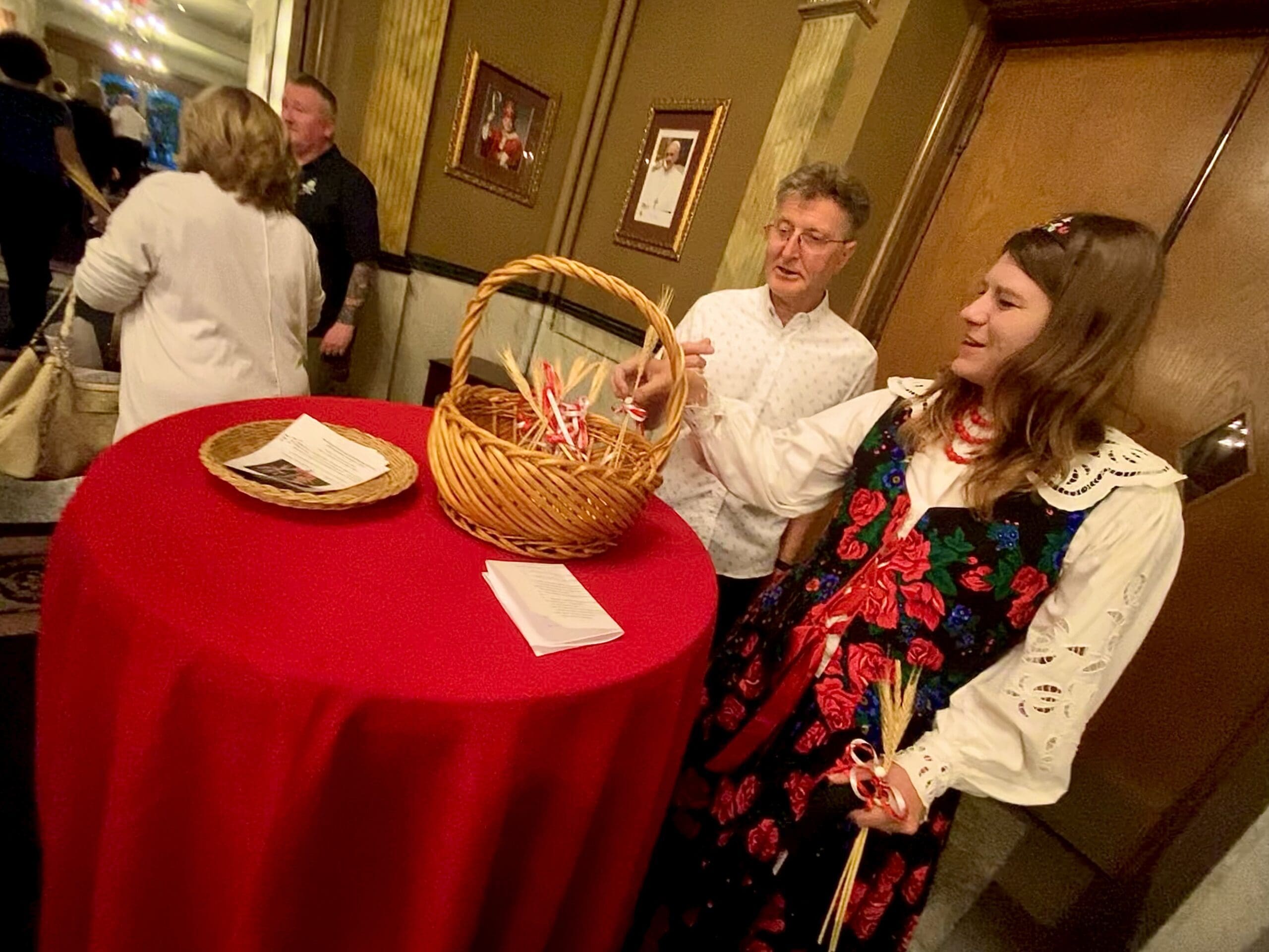 Mira handing out the wheat trios she made to honor the heroes